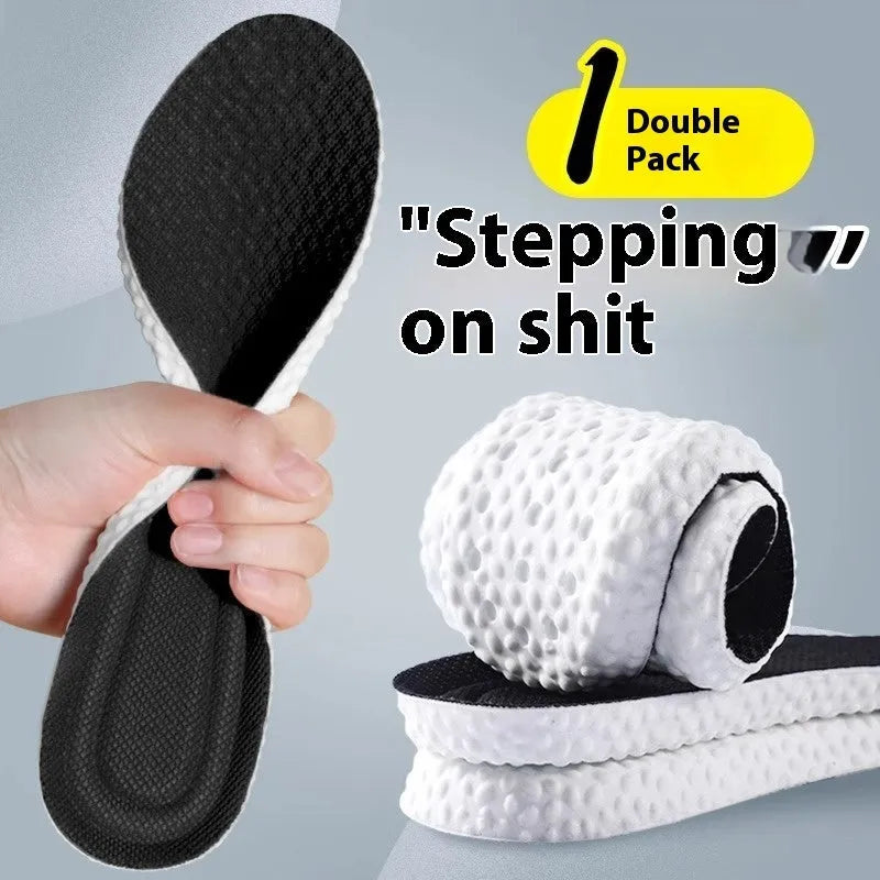 Breathable deodorant sports insoles in grey, black, and orange colours on a white background.