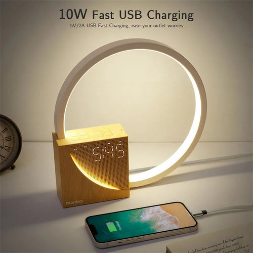 Navy blue touch control bedside lamp with digital alarm clock display and natural sounds functions.