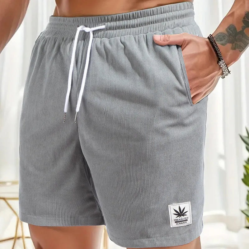 Men's drawstring summer leisure shorts in straight leg design with elastic polyester fabric