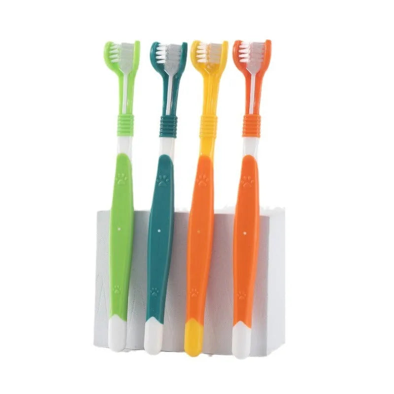 Pet toothbrush with nylon bristles and plastic handle in green colour