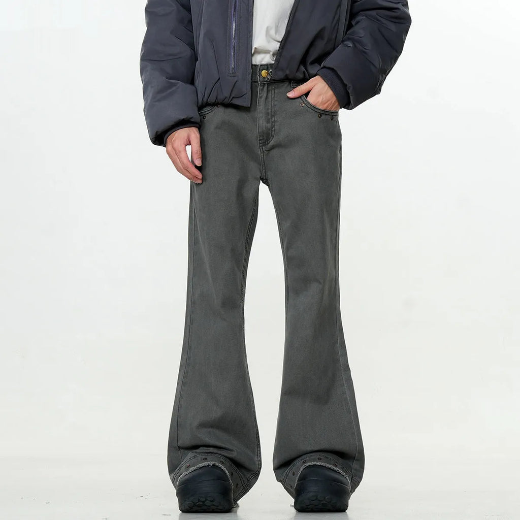 Black American retro straight-leg skinny jeans on a hanger, showing mid-waist and zipper fly detail.