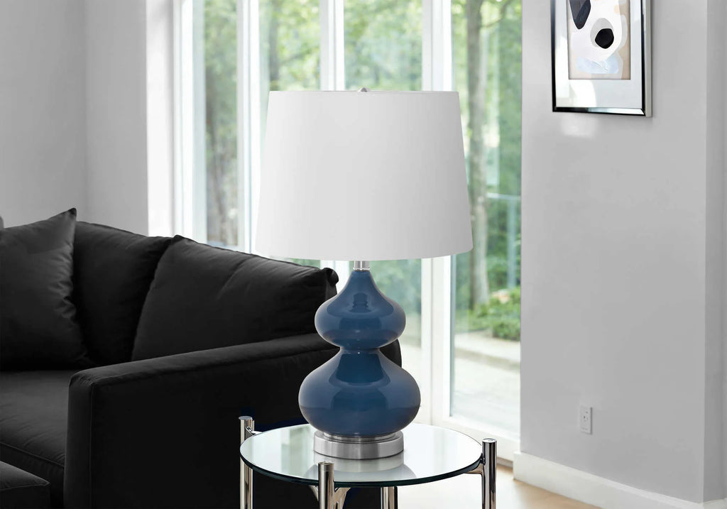 64cm tall crystal glass desk lamp with dark blue cloth lampshade on wooden desk