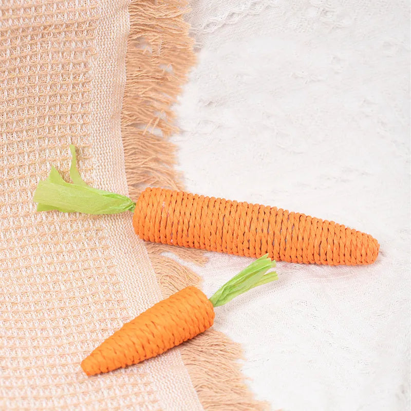 Cat toys multipack with carrot-shaped paper crinkle toys, ringing stones, interactive sticks, and dental grinding sticks