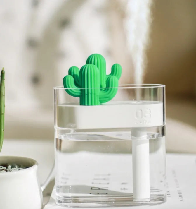 Transparent green cactus-shaped portable USB humidifier on a desk, 120mm tall