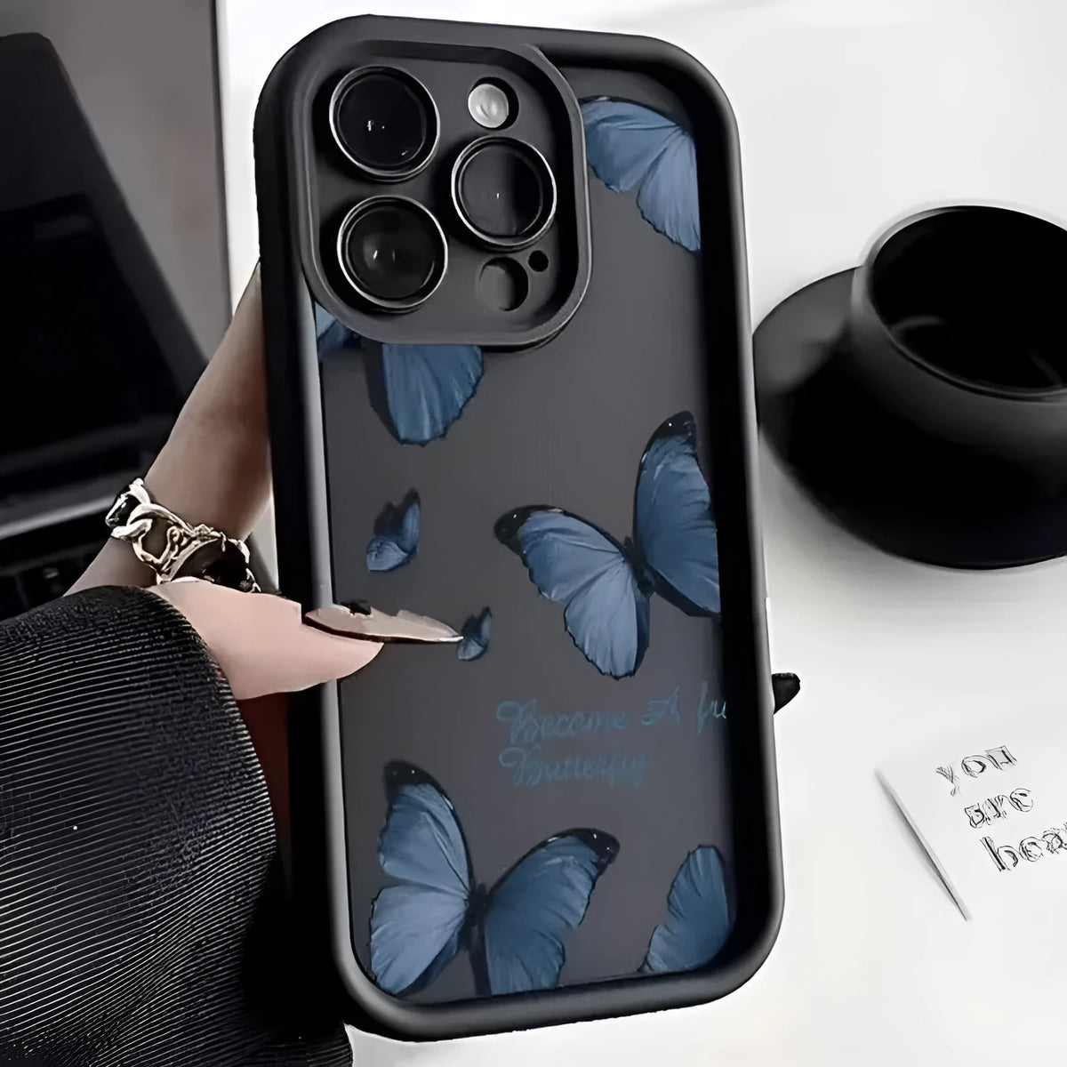 Blue butterfly printed edging drop-resistant TPU phone case for iPhone in black colour