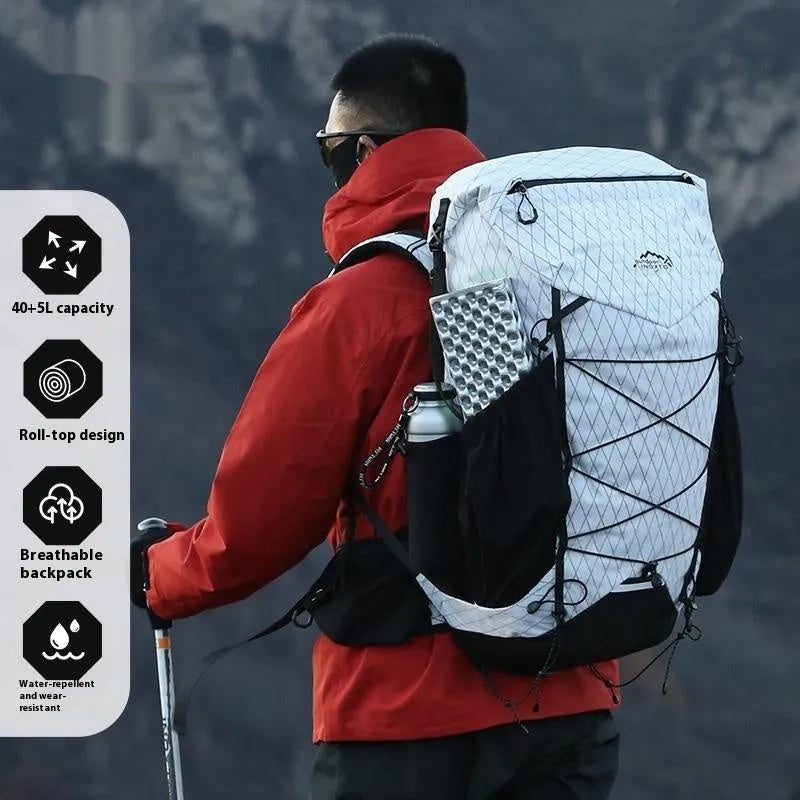 Large capacity waterproof mountaineering backpack with internal frame in black for camping and hiking
