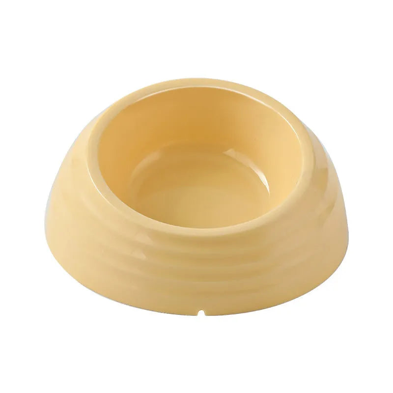 Stainless steel cat bowl on a plastic base in a choice of beige, brown, or light green.