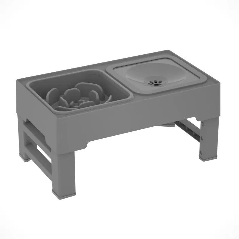 Adjustable height grey dog feeding stand with two stainless steel bowls on an anti-slip base