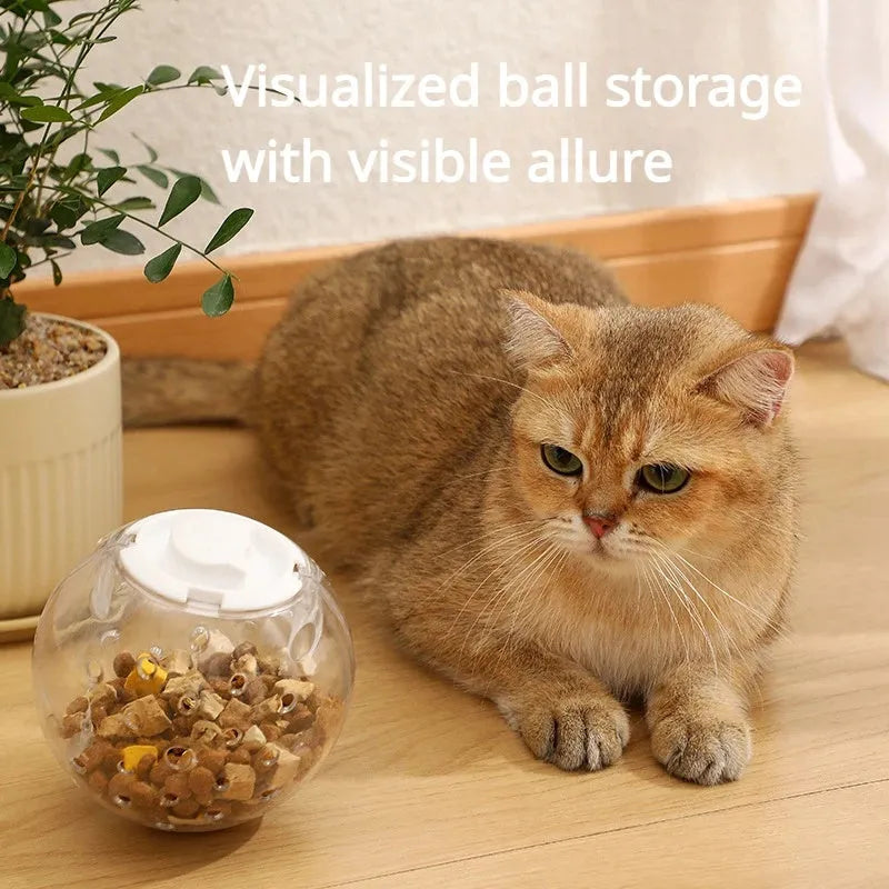Clear blue ABS plastic slow feeder ball for cats, 11.5cm in diameter, on a wooden floor.