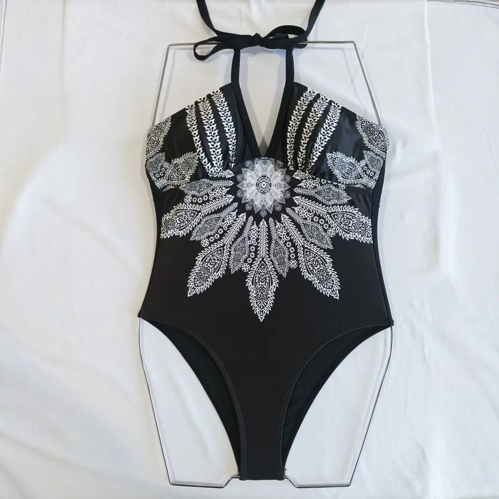 Black women's triangle pattern corset one-piece swimsuit with backless design and tight fit