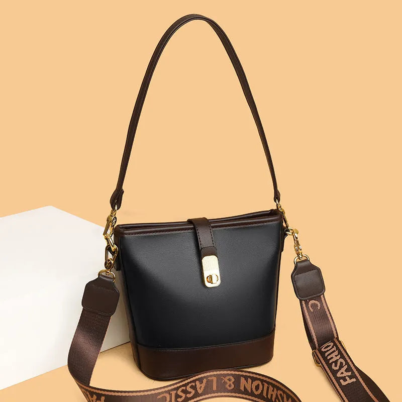 Korean fashion bucket bag in black PU leather with double shoulder straps and organised interior compartments