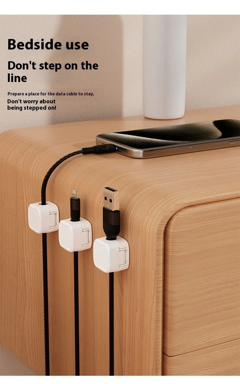 Magnetic cable management clips in white and black with adhesive backing