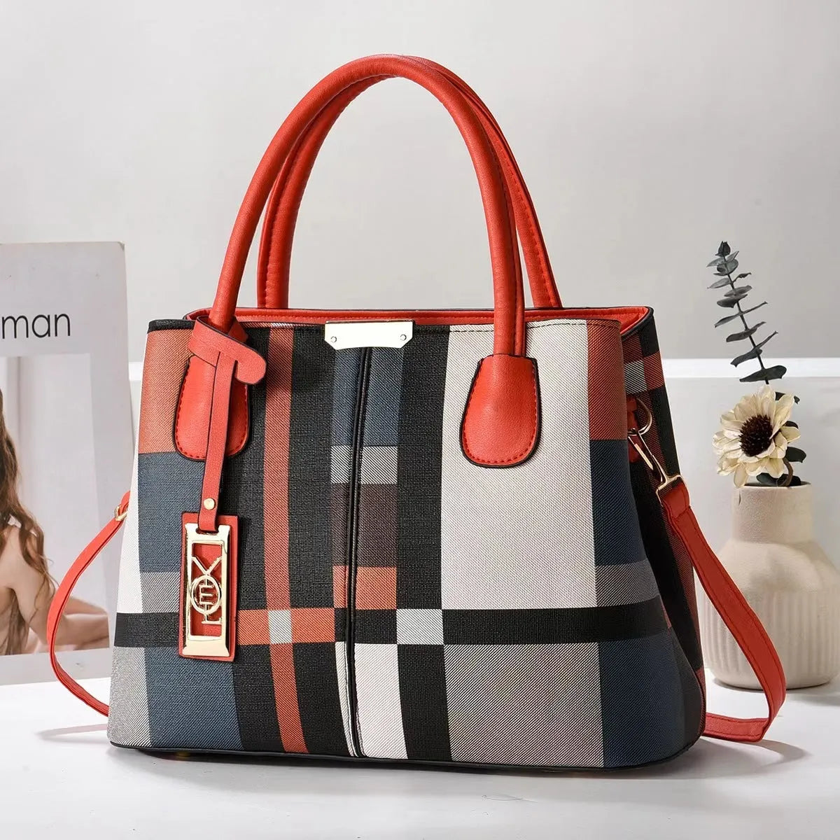 Women's large capacity shoulder bag in soft PU leather with adjustable strap and multiple colour options