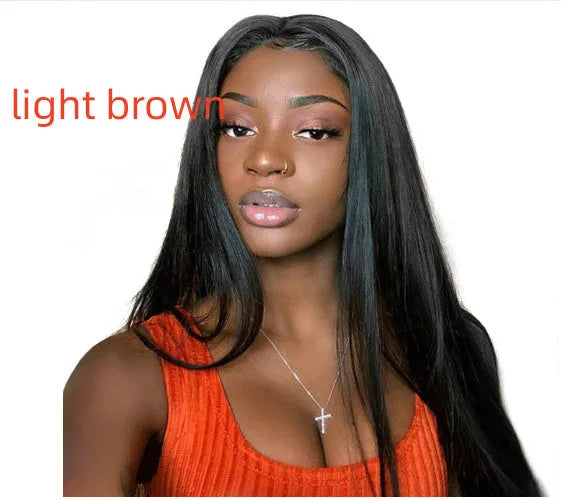 Long straight black synthetic wig with centre-parted bangs on display
