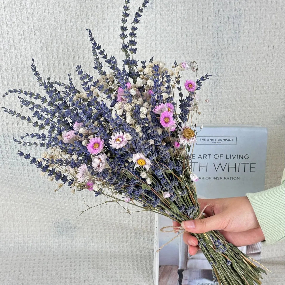 Lavender dried flowers bouquet 43cm in white colour on a table as home decor ornament