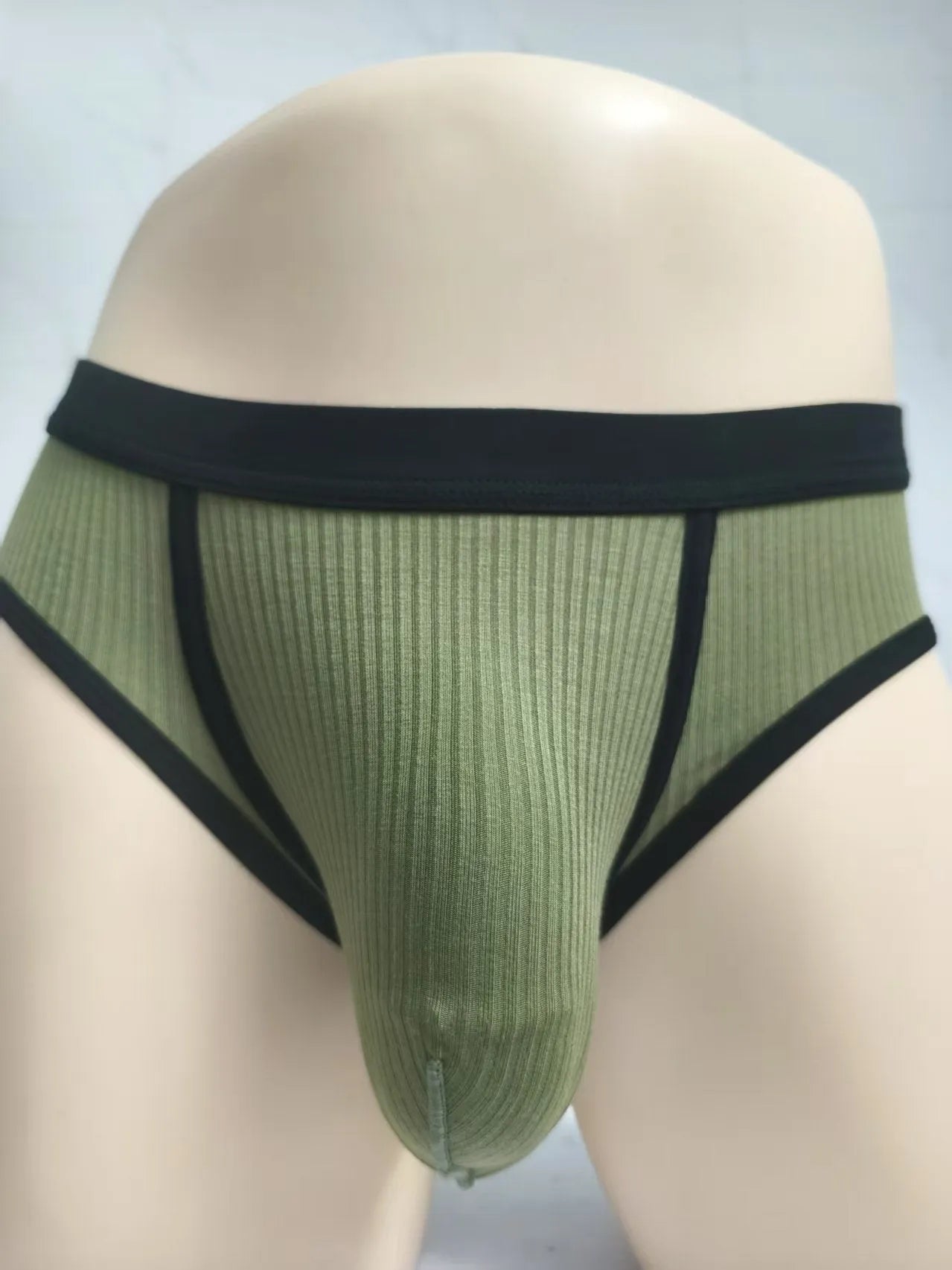 Men's black U-shaped underwear with triangle pouch design showing knitted viscose fabric texture