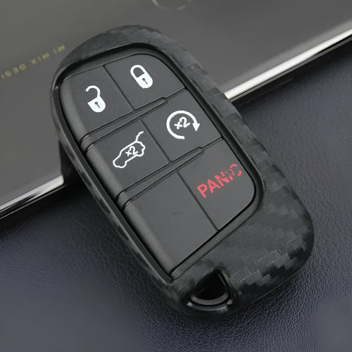Black carbon fibre silicone key case for Dodge Chrysler Fiat car remote keys, shown in bag and buckle styles.