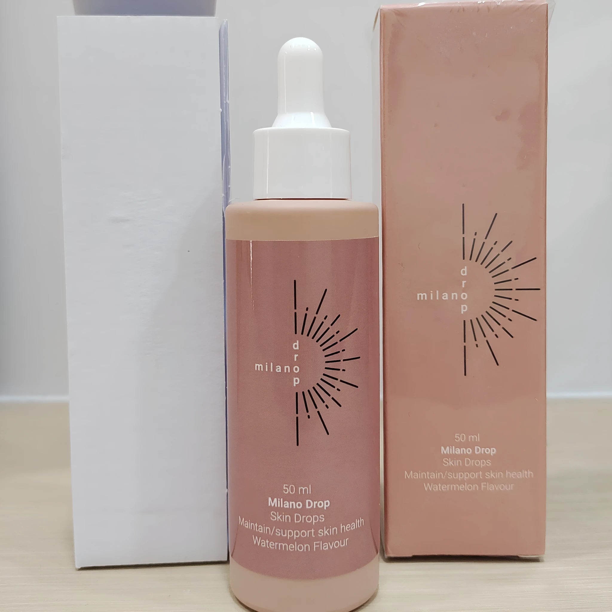 50ml tanning serum bottle with dark bronzer drops in mi lian colour box packaging