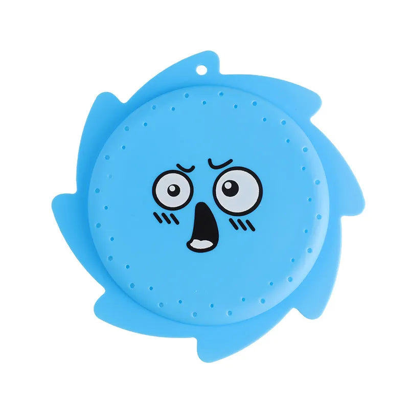 Silicone water toy in blue expression style on a wet surface for bath play