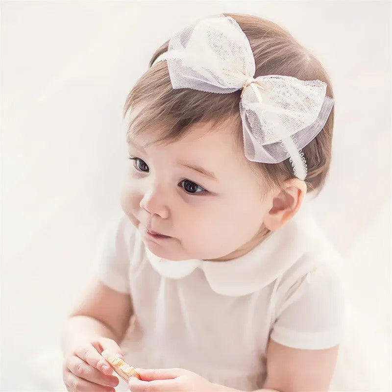 Baby girls headband with double bow-knot and lace floral design in soft cloth material