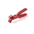Carmine coloured anti-scalding clip with PP handle and silicone grip on kitchen counter