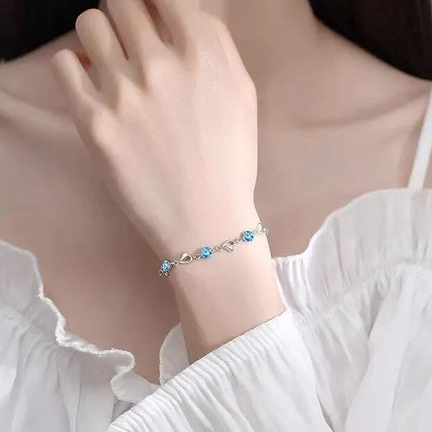 Blue heart necklace and bracelet jewellery set with diamond detailing on copper chains