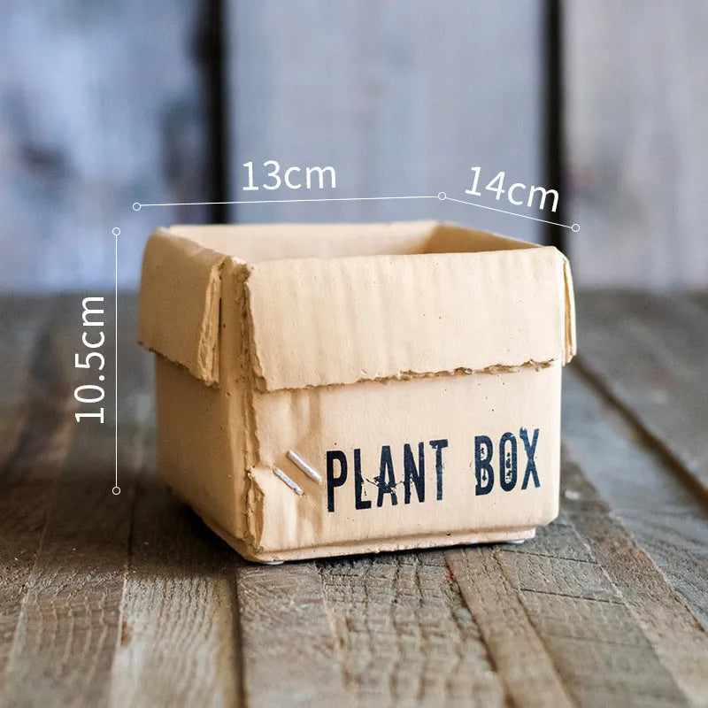 Cement flowerpot with perforated base and Nordic brown paper box design