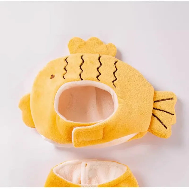 Yellow onsen fish pet costume with fish-shaped hat and vest on a dog with leash ring