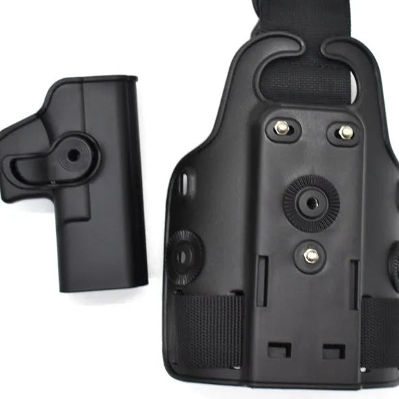 Green tactical plastic leg holster attached to a waist plate, showing quick-pull opening.