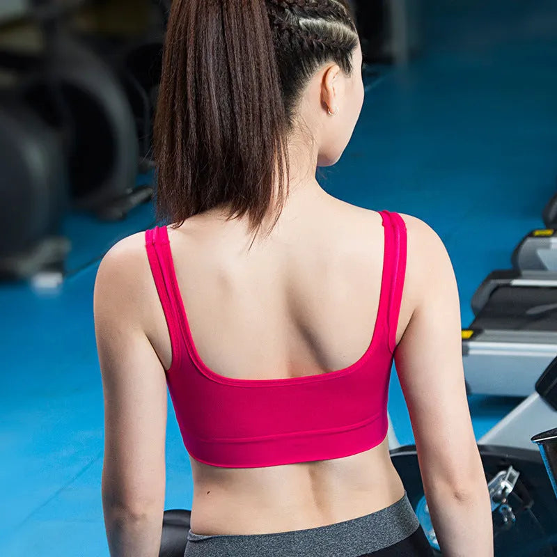 Women's reinforced shockproof sports bra in pink with fixed double-shoulder straps and 3/4 cup design