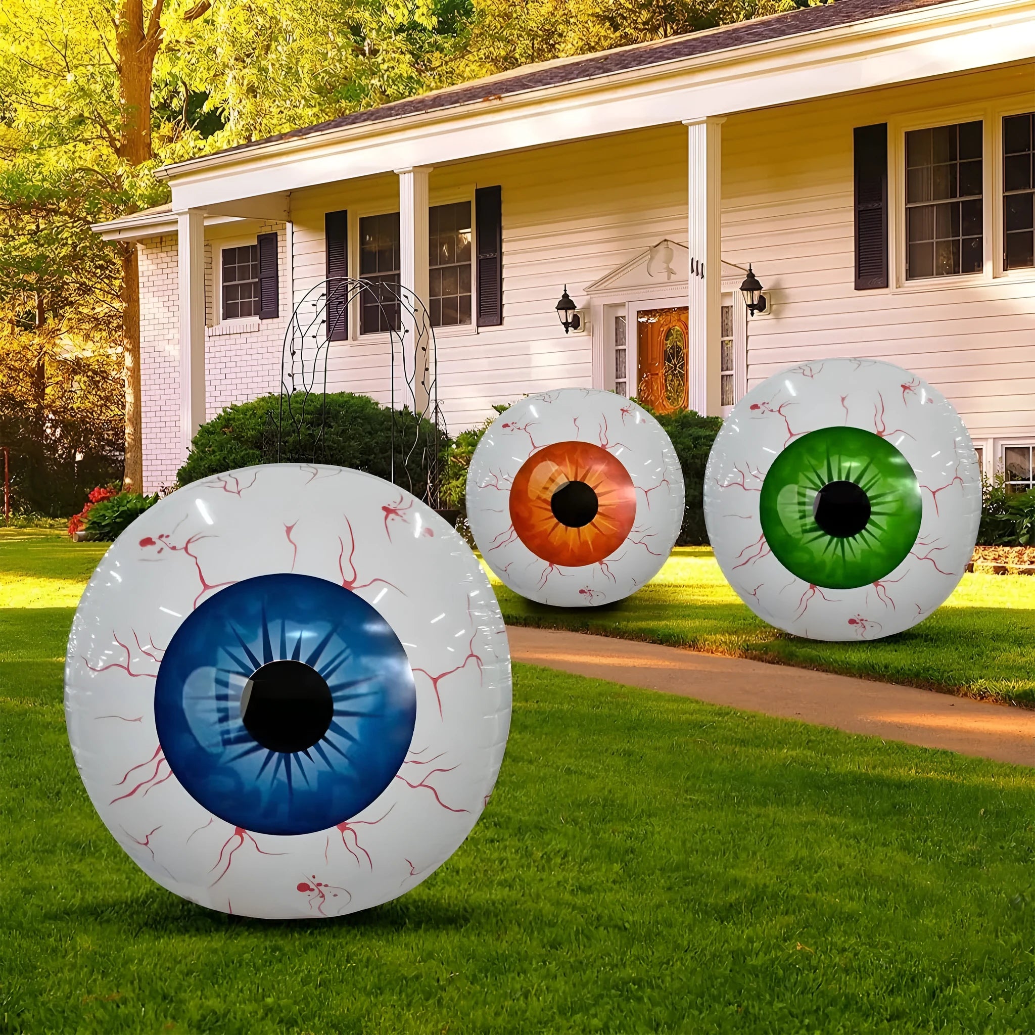 Green Halloween balloon with bloodshot eyeball design, shown inflated to 40 cm diameter