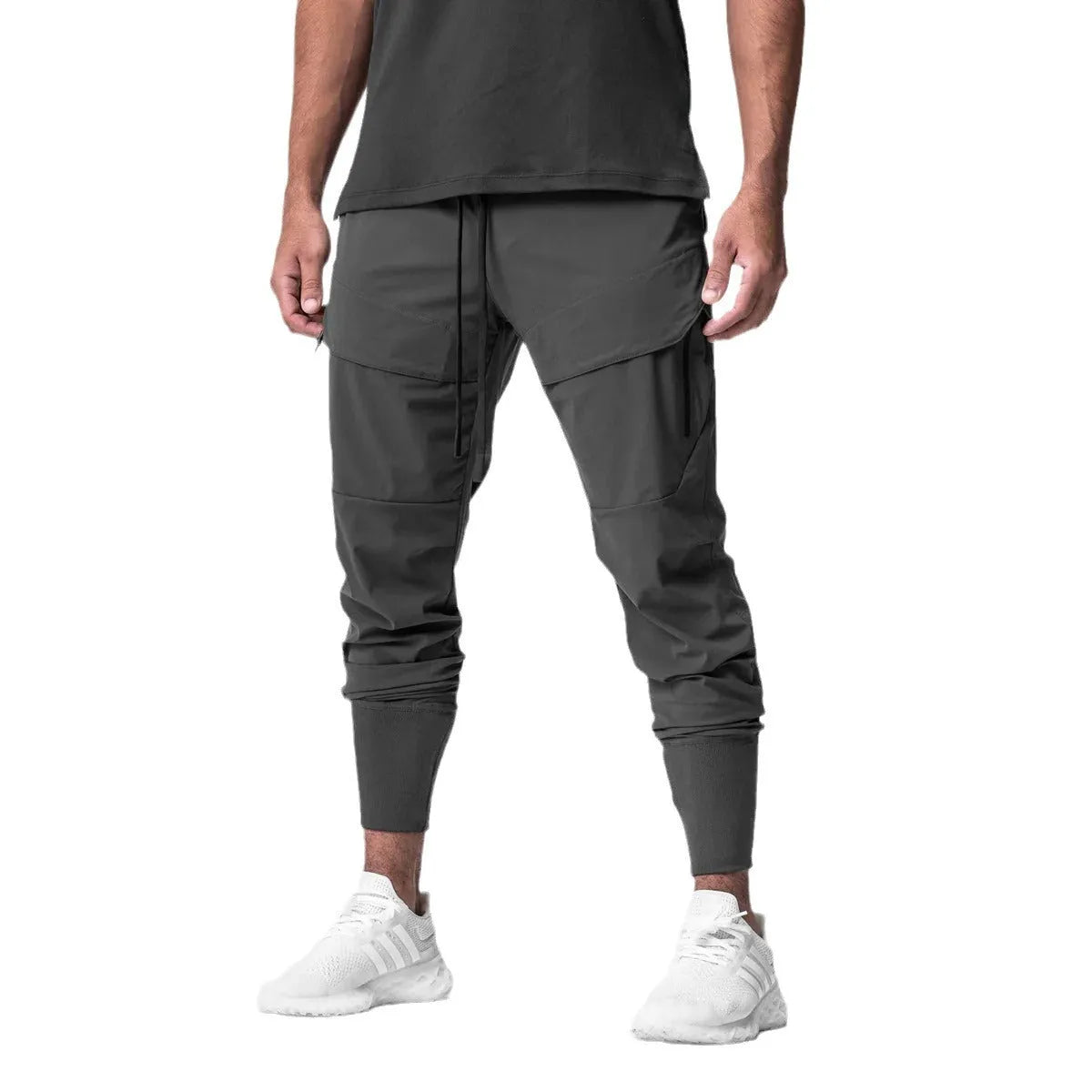 Men's solid colour polyester jogger pants in black, mid-waist style, casual sports trousers