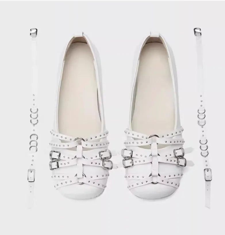 Women's black patent leather flat shoes with buckle closure and square toe