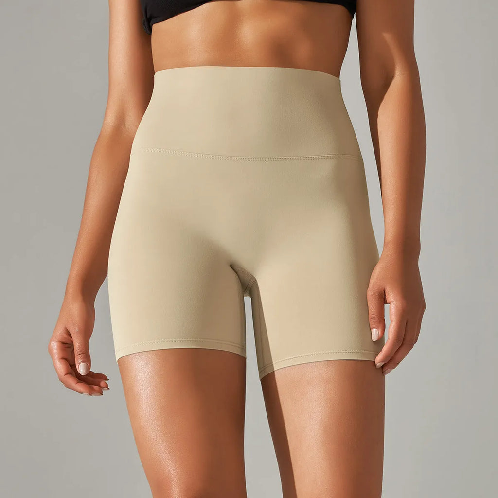 Women's high waist hip lift fitness tights in moisture-wicking fabric for gym and daily wear