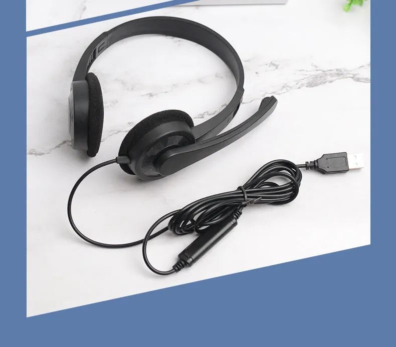 Black wired USB headset with sponge ear cushions and microphone for computer gaming and calls