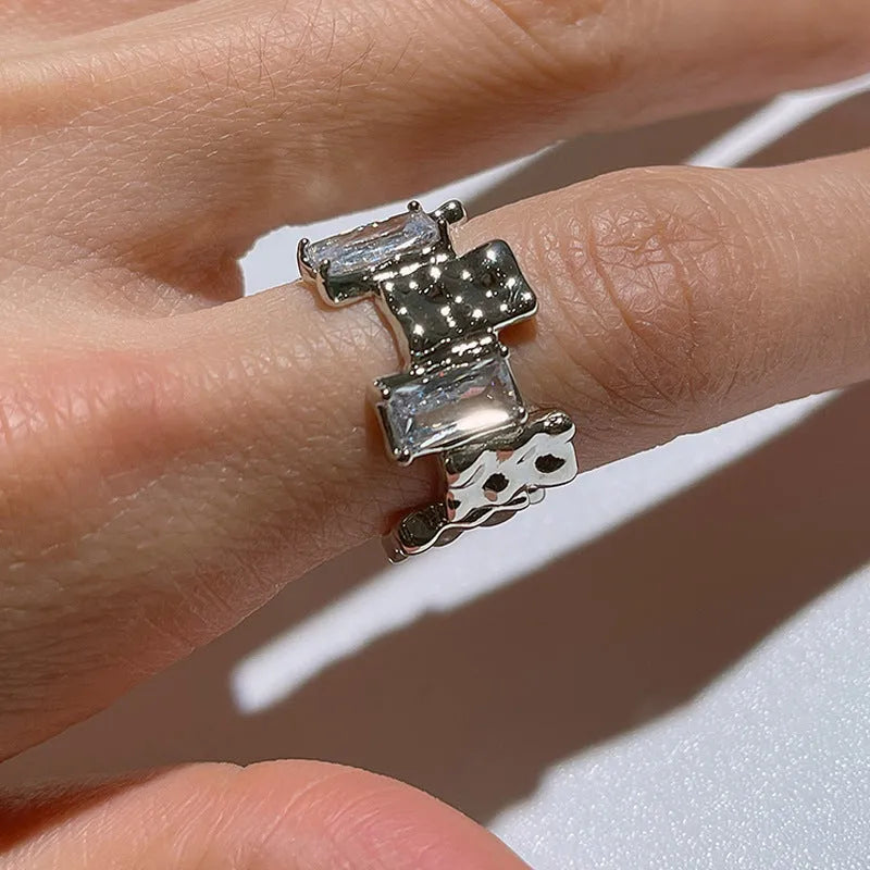 Geometric open design zircon ring with silver plating and 3D decoration