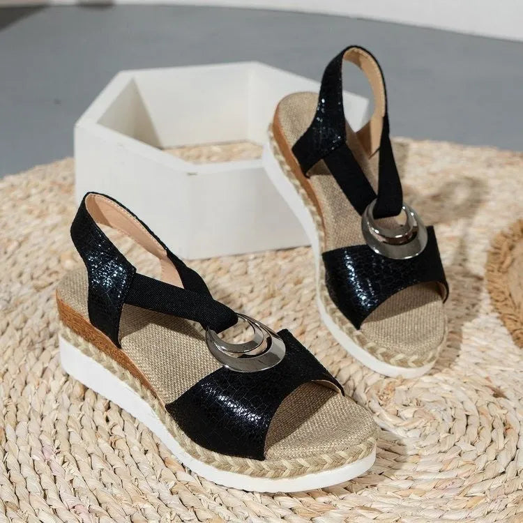 Platform wedge peep toe Roman sandals with sequin cloth upper and ankle buckle in black
