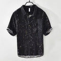 Men's black and white cardigan-style polo shirt with lapel collar and short sleeves