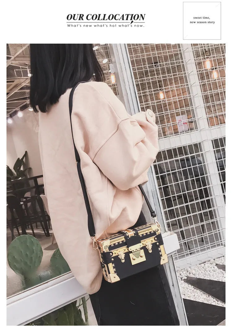 Women's hard-sided black PU leather flap shoulder bag with rivet decoration and hasp closure