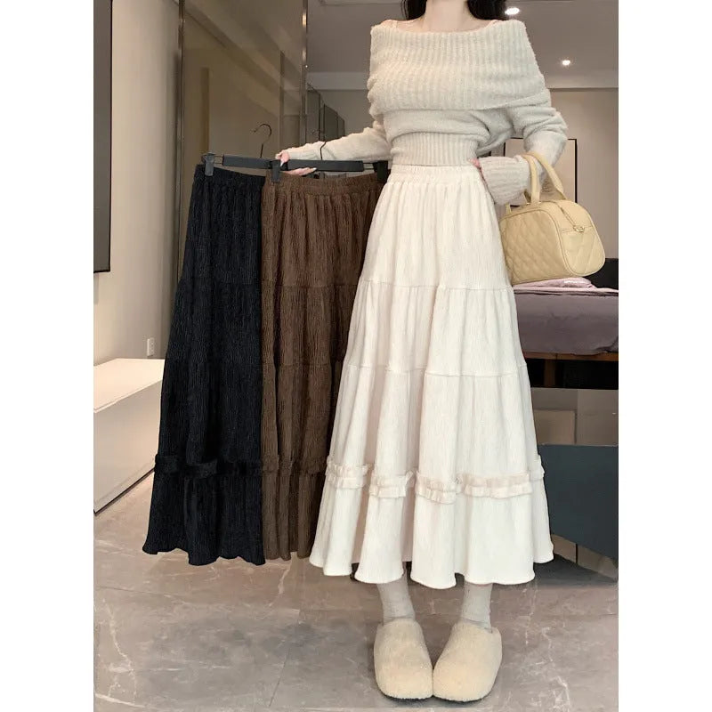 Korean style A-line corduroy skirt with elastic waistband in beige colour showing midi length