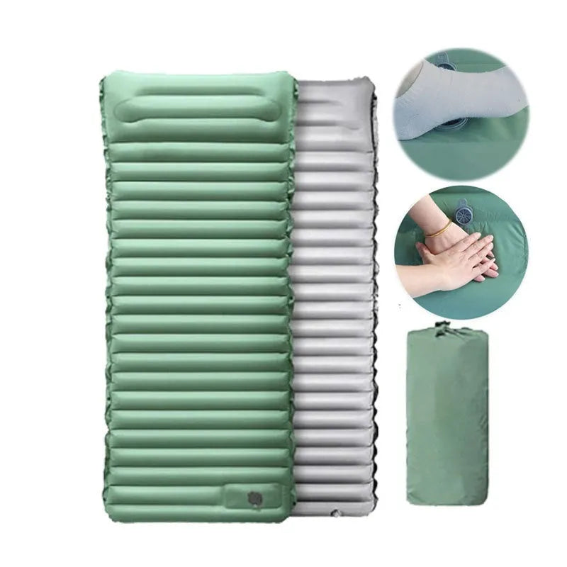Single-size portable inflatable camping mattress in grey on a tent floor