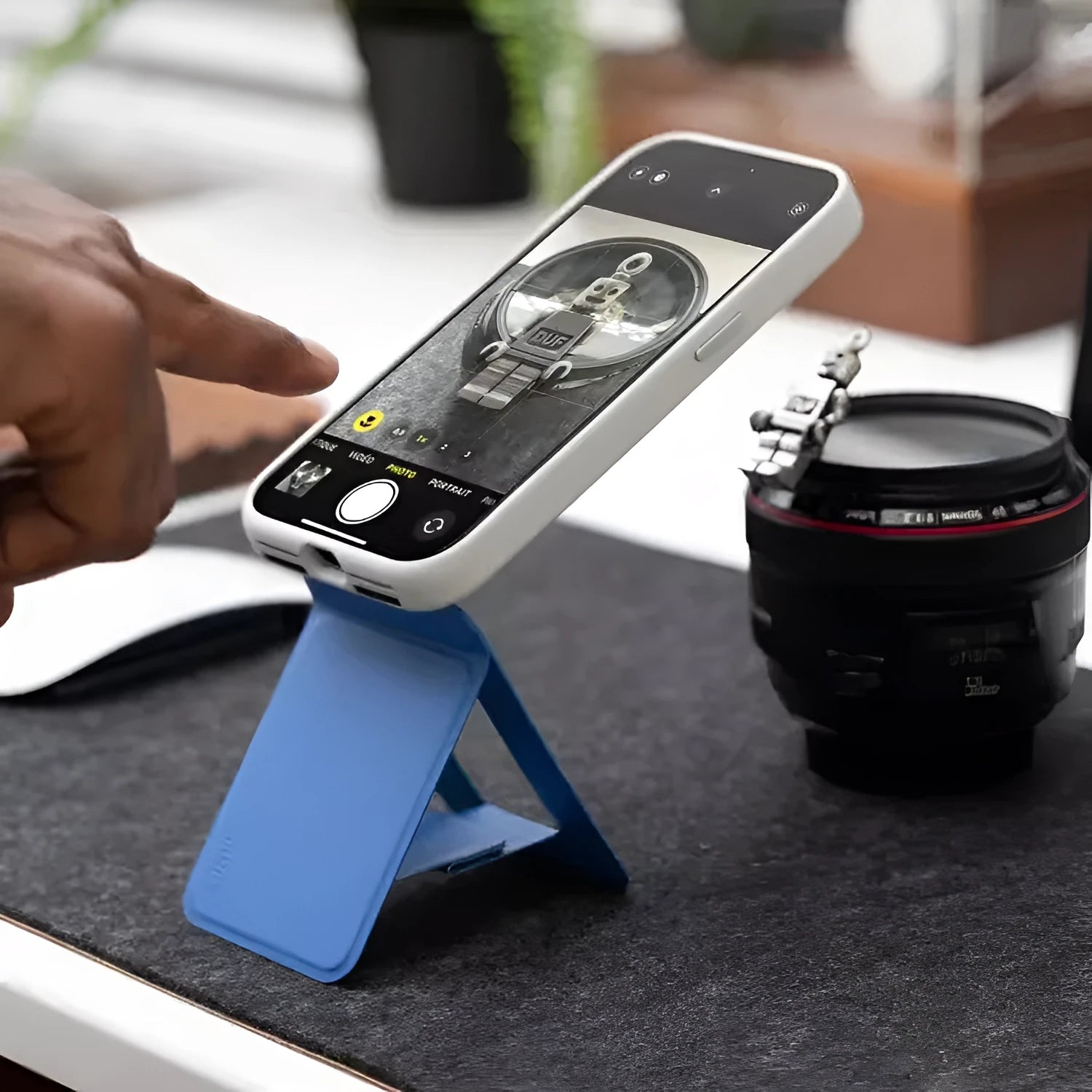 Slim magnetic mobile phone holder case in four colour options showing leather and fibre glass construction