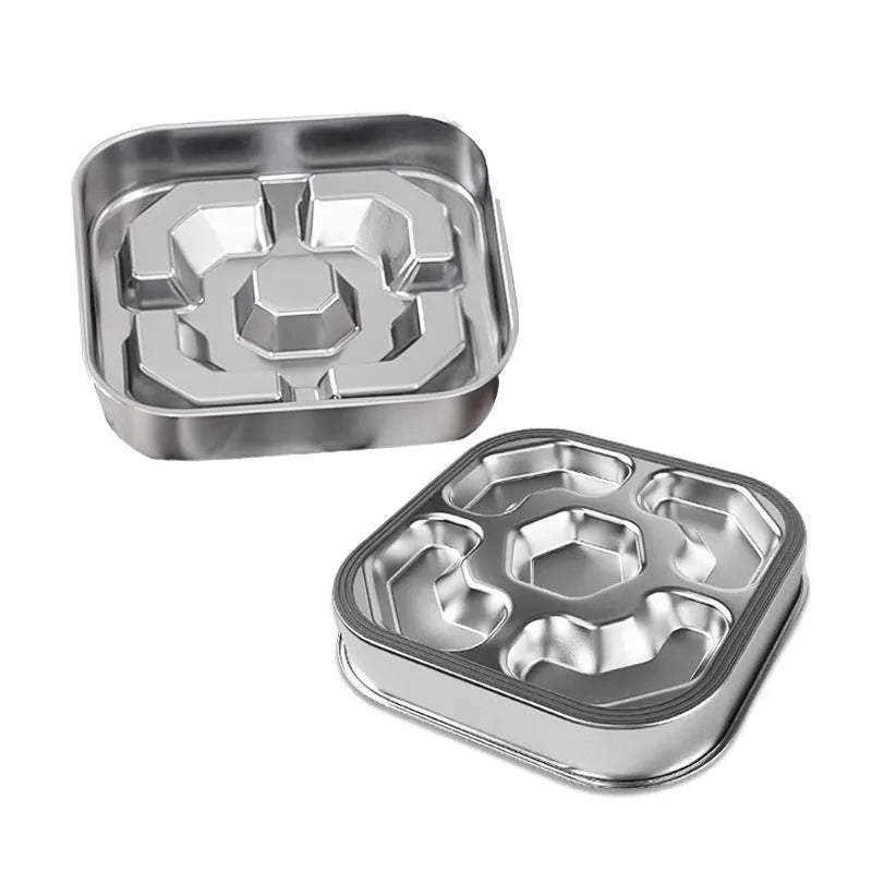 Stainless steel slow feeding dog bowl with raised bone square pattern on a non-slip square base