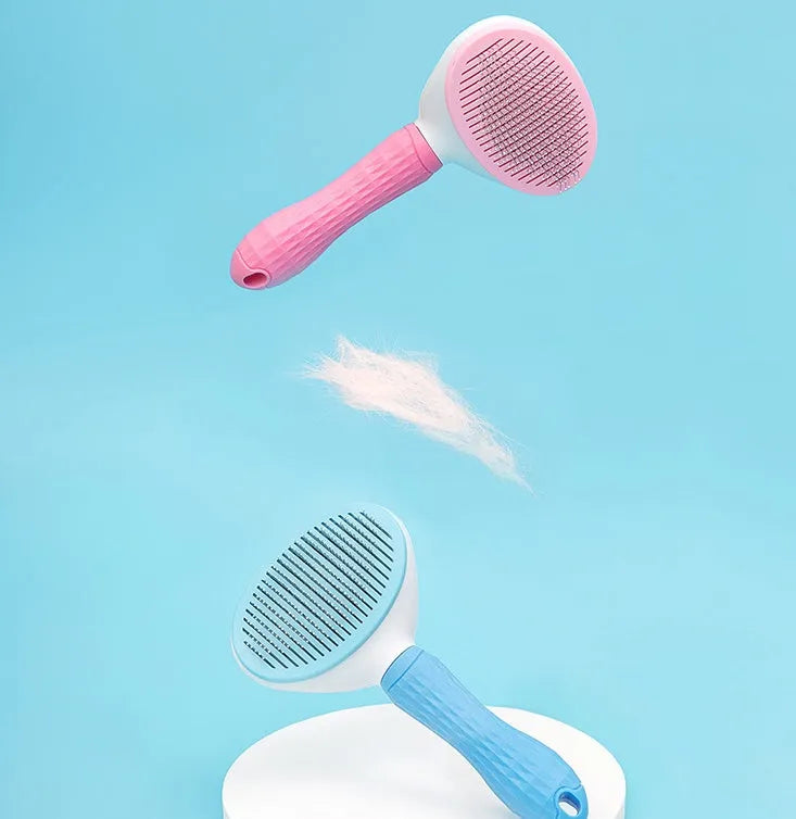 Blue self-cleaning pet comb with fine stainless steel teeth and rubber body on white background