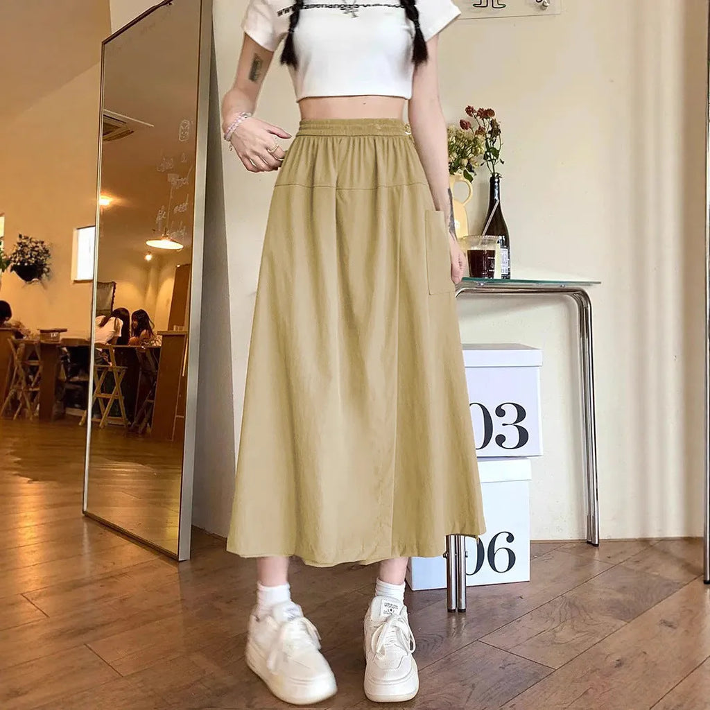 Camel coloured women's wide leg skirt with elastic waist and drape detail
