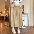 Camel coloured women's wide leg skirt with elastic waist and drape detail
