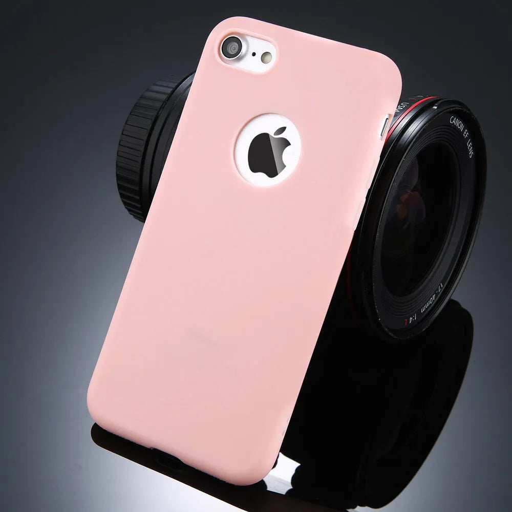 Soft plain silicone TPU phone case for iPhone in candy colours like blue, pink, and red.