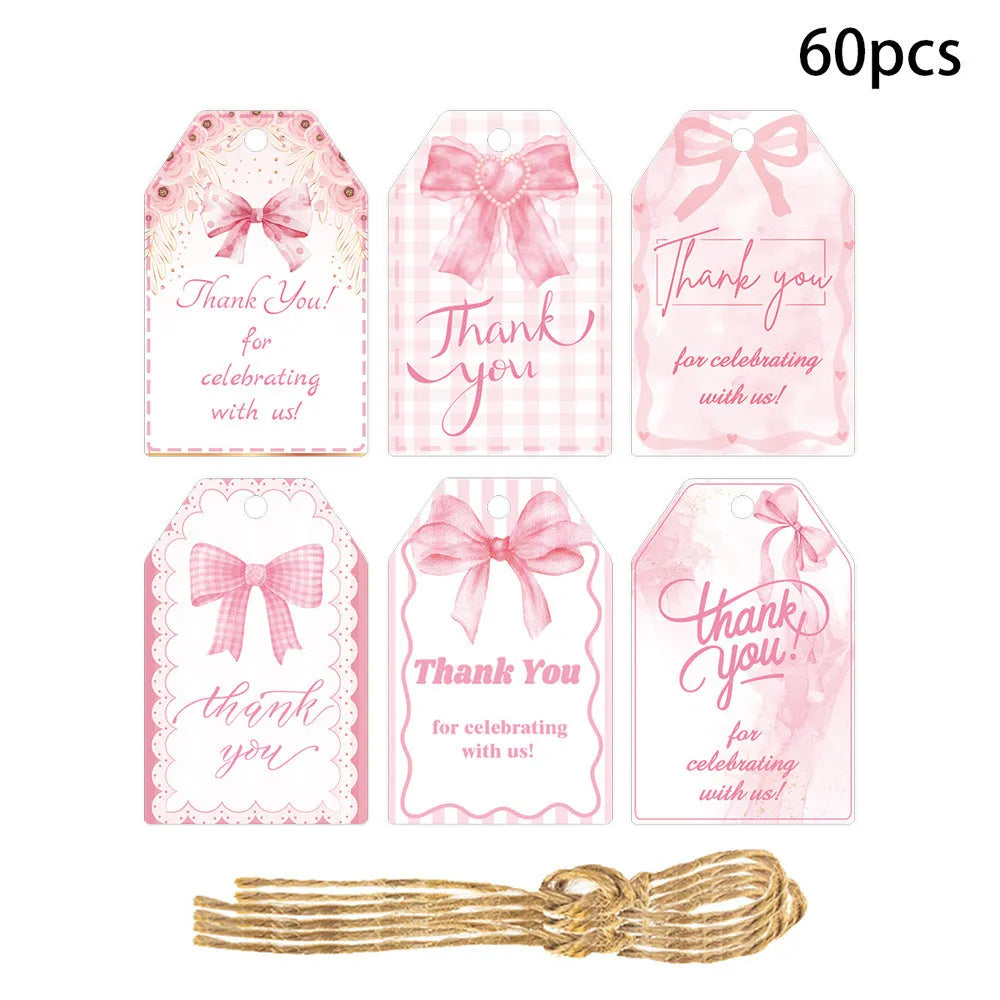 Three style variations of creative bowknot gift label tags with hemp rope attachments