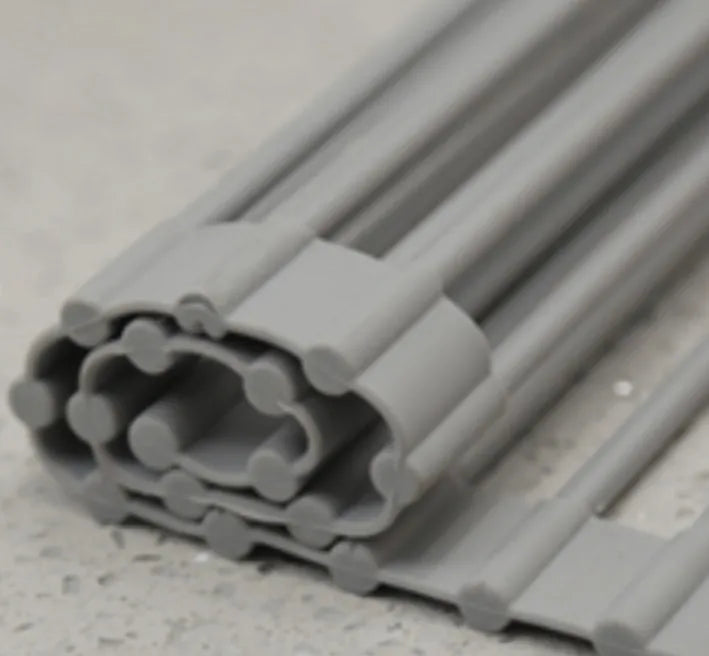 Stainless steel folding kitchen sink drain rack shown in a choice of colours