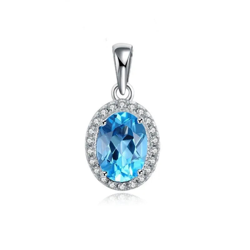 925 Sterling Silver four-piece jewellery set with Blue Topaz gemstones including earrings, ring, pendant and necklace